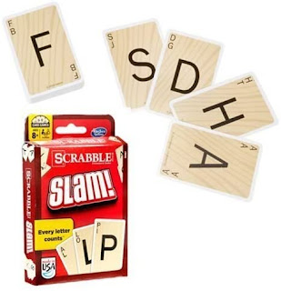 Scrabble Slam! card game in the original packaging, 5 cards are fanned outside of the packaging.
